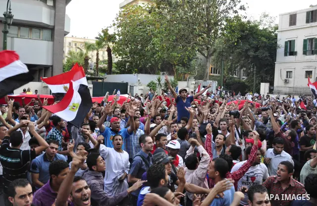 Egyptians are gathered at one of the Tharir square entrances where a sit-in is taking place, Cairo, Egypt, 12 July 2011. Egypt's military rulers on 12 July warned protesters against "harming public interests" after they...