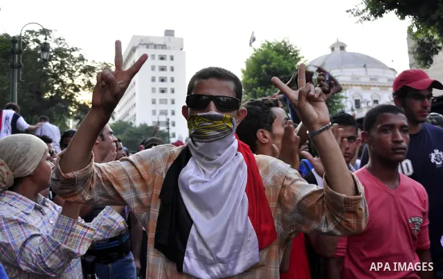 Egyptians are gathered at one of the Tharir square entrances where a sit-in is taking place, Cairo, Egypt, 12 July 2011. Egypt's military rulers on 12 July warned protesters against "harming public interests" after they...