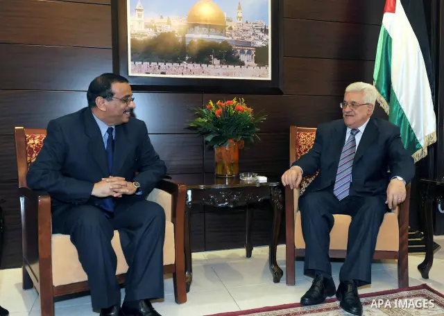 Palestinian President Mahmoud Abbas (Abu Mazen) meets with the UAE Ambassador to the Palestinian National Authority, Abdullah Sultan Nasser Al Ameri in the West Bank city of Ramallah on July 13, 2011. Photo by Mustafa Ab...