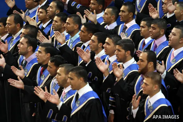 Palestinian students participate in their graduation ceremony at the Islamic University in Gaza city on July 13, 2011. Photo by Mohammed Asad