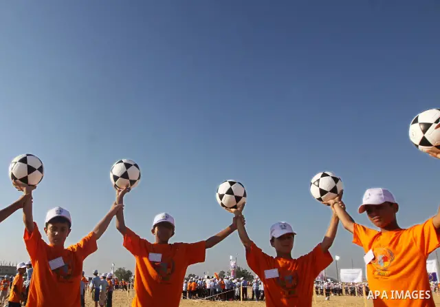 Palestinian children play with balls during summer camp activities supervised by the UN Relief and Works Agency (UNRWA) in Rafah in the southern Gaza Strip on July 14, 2011. Photo by Ali Jadallh