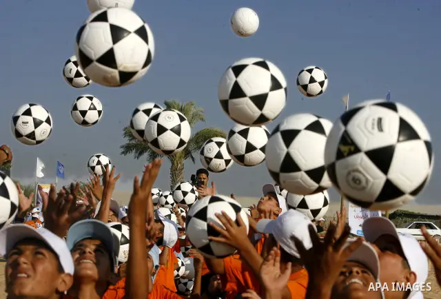 Palestinian children play with balls during summer camp activities supervised by the UN Relief and Works Agency (UNRWA) in Rafah in the southern Gaza Strip on July 14, 2011. Photo by Ali Jadallh