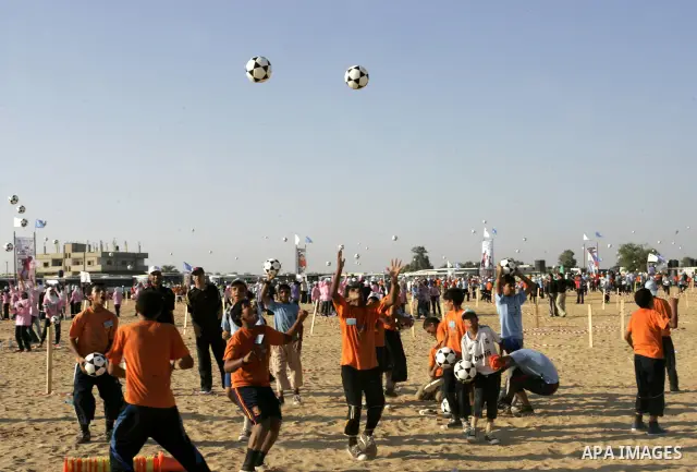 Palestinian children play with balls during summer camp activities supervised by the UN Relief and Works Agency (UNRWA) in Rafah in the southern Gaza Strip on July 14, 2011. Photo by Abed Rahim Khatib