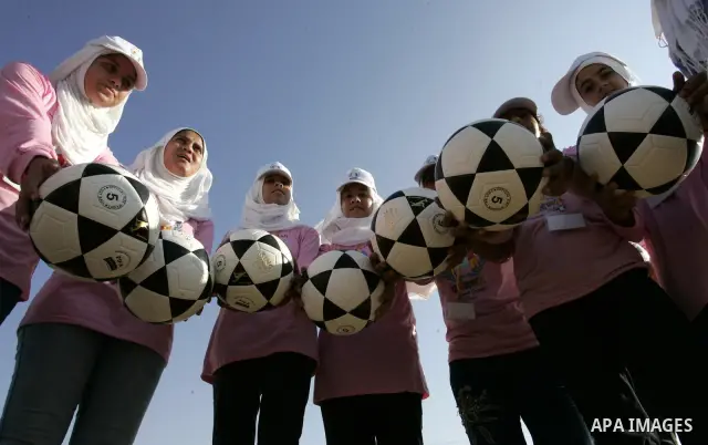 Palestinian children play with balls during summer camp activities supervised by the UN Relief and Works Agency (UNRWA) in Rafah in the southern Gaza Strip on July 14, 2011. Photo by Abed Rahim Khatib