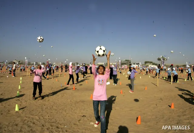 Palestinian children play with balls during summer camp activities supervised by the UN Relief and Works Agency (UNRWA) in Rafah in the southern Gaza Strip on July 14, 2011. Photo by Abed Rahim Khatib