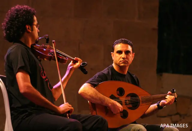Members of the Palestinian band music, from the city of Akka, perform during the festival "Wayn ala Ramallah " in the West Bank city of Ramallah on July 14, 2011. Photo by Issam Rimawi