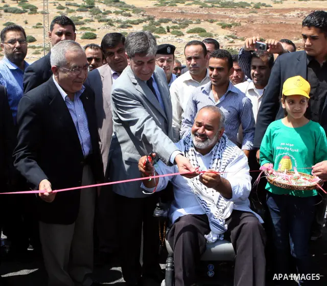 Palestinian Prime Minister, Salam Fayyad attends the opening celebration of al-Salam street in the West Bank town of Tubas on July 16, 2011. Photo by Mustafa Abu Dayeh