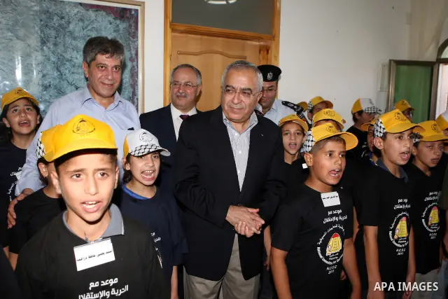 Palestinian Prime Minister, Salam Fayyad attends the opening celebration of al-Tayassir school in the West Bank town of Tubas on July 16, 2011. Photo by Mustafa Abu Dayeh