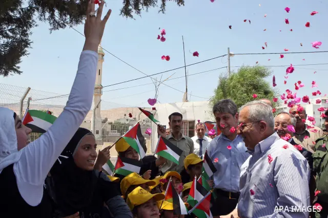 Palestinian Prime Minister, Salam Fayyad visits the summer camp "Palestine in the eyes of martyrs' sons" in al-Fara'a refugee camp in the West Bank on July 16, 2011. Photo by Mustafa Abu Dayeh