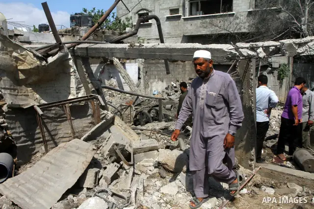 A Palestinian man inspects damages in Beit Hanun in the northern Gaza Strip on July 17, 2011 as seven people were wounded by what Palestinian medical sources said was an Israeli air strike, but Israel denied it had carri...