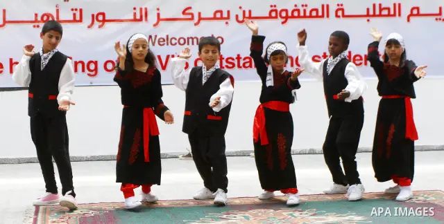 Palestinian talented students with disabilities visual attend a ceremony in the rehabilitation Centre for Visually Impaired in Gaza city on July 17, 2011. Photo by Ashraf Amra