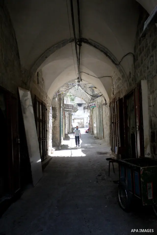 A Palestinian boy walks in the Old City of Nablus in the West Bank on July 18, 2011. Photo by Wagdi Eshtayah