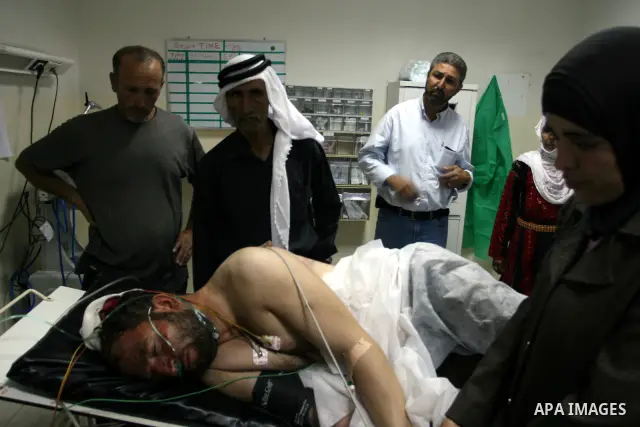 Palestinian man Ahmed Abu Alia 43, From the village of Michmas in Ramallah in the West bank, recieves medical treatment at a hospital in Ramallah on on July 18, 2011. Abu Alia was apparnetly attacked by Jewish settlers f...