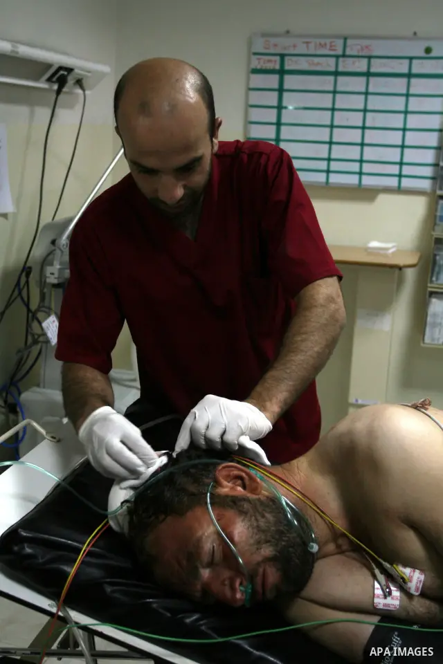 Palestinian man Ahmed Abu Alia 43, From the village of Michmas in Ramallah in the West bank, recieves medical treatment at a hospital in Ramallah on on July 18, 2011. Abu Alia was apparnetly attacked by Jewish settlers f...