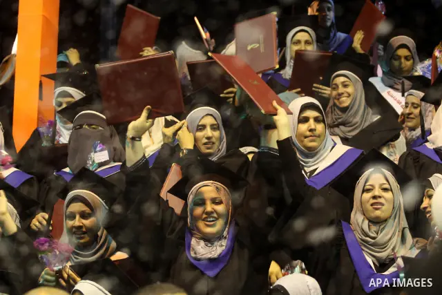 Palestinian students participate in their graduation ceremony at the University College of Applied Sciences in Gaza city on July18, 2011. Photo by Mohammed Asad
