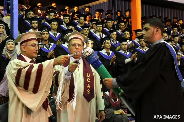 Palestinian students participate in their graduation ceremony at the University College of Applied Sciences in Gaza city on July18, 2011. Photo by Mohammed Asad
