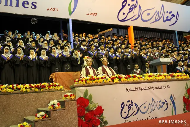 Palestinian students participate in their graduation ceremony at the University College of Applied Sciences in Gaza city on July18, 2011. Photo by Mohammed Asad
