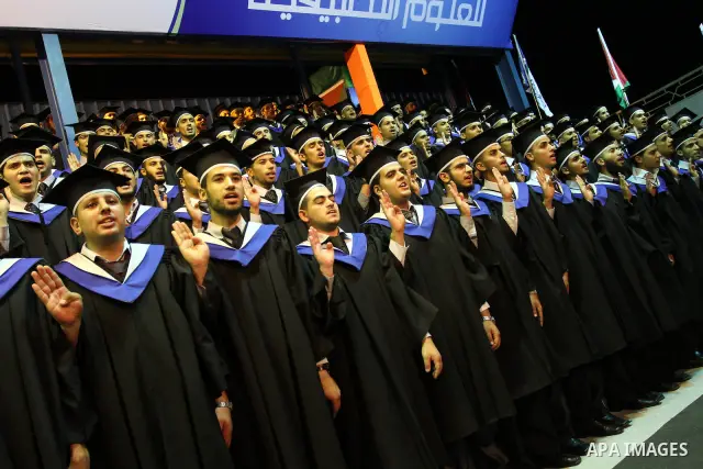 Palestinian students participate in their graduation ceremony at the University College of Applied Sciences in Gaza city on July18, 2011. Photo by Mohammed Asad