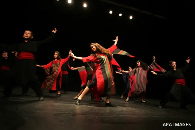 Palestinian children dance the traditional Dabka during a musical concert at Al-Hakawati theatre in Jerusalem on July 19,2011. Photo by Mahfouz Abu Turk