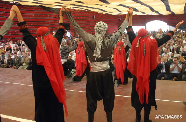 Palestinians participate in the International Conference to develop the centers of the historical cities and develop their economical situation, in the West Bank city of Hebron on July 19,2011. Photo by Najeh Hashlamoun