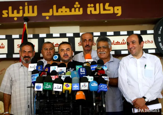 Palestinian factions leaders participate in a press conference against the Israeli naval which seized the French ship, in Gaza city, Tuesday, July 19, 2011. Israeli naval commandos on Tuesday seized control of a French s...
