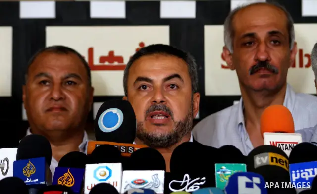 Palestinian factions leaders participate in a press conference against the Israeli naval which seized the French ship, in Gaza city, Tuesday, July 19, 2011. Israeli naval commandos on Tuesday seized control of a French s...