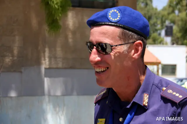 An EU policeman trains Palestinian policemen to organise the traffic in the West Bank city of Salfit on July 20,2011. . Photo by Wagdi Eshtayah