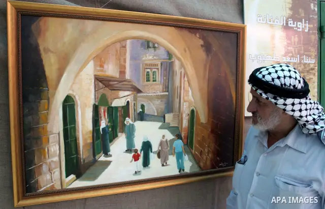 Palestinians enjoy the restoration places in the old city of Hebron on July 20,2011, as Palestinians participate in the second day of the International Conference to develop the centers of the historical cities and devel...