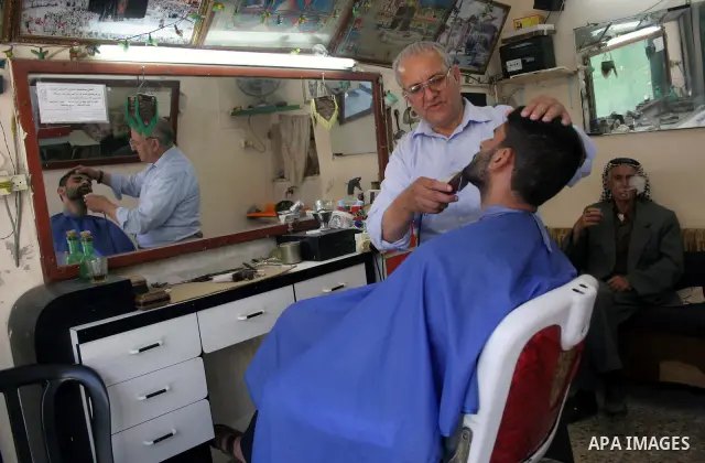 Palestinians enjoy the restoration places in the old city of Hebron on July 20,2011, as Palestinians participate in the second day of the International Conference to develop the centers of the historical cities and devel...