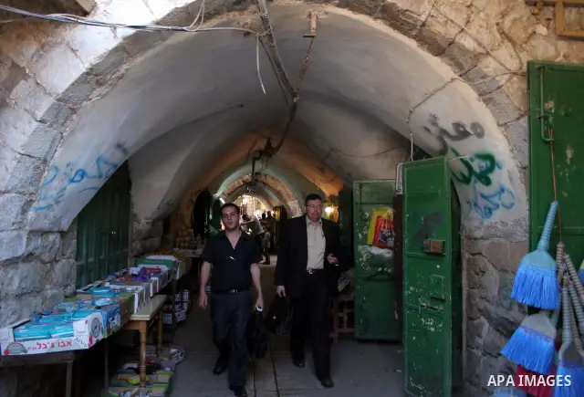 Palestinians enjoy the restoration places in the old city of Hebron on July 20,2011, as Palestinians participate in the second day of the International Conference to develop the centers of the historical cities and devel...