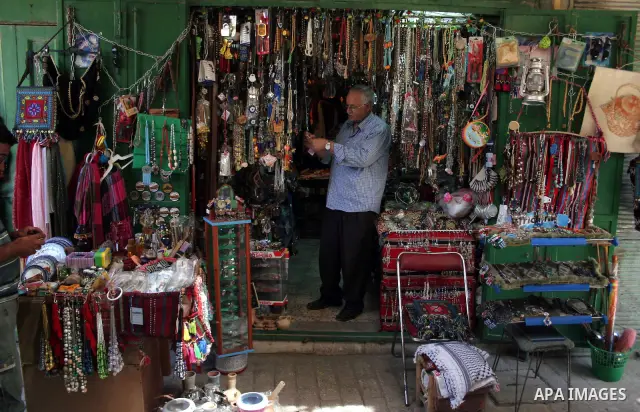 Palestinians enjoy the restoration places in the old city of Hebron on July 20,2011, as Palestinians participate in the second day of the International Conference to develop the centers of the historical cities and devel...