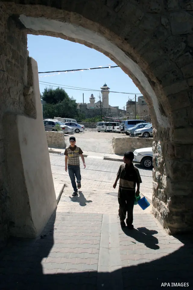 Palestinians enjoy the restoration places in the old city of Hebron on July 20,2011, as Palestinians participate in the second day of the International Conference to develop the centers of the historical cities and devel...