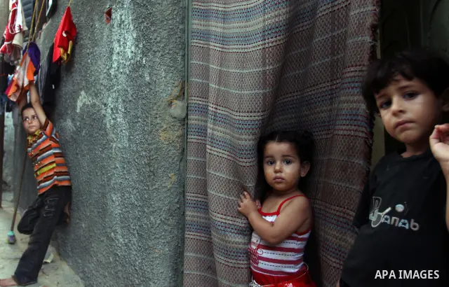 Palestinian children play at the Jabaliya refugee camp, which is the largest of the eight refugee camps in the Gaza Strip, with around 108,000 registered refugees living in the camp on July 21, 2011. Photo by Ali Jadalla...