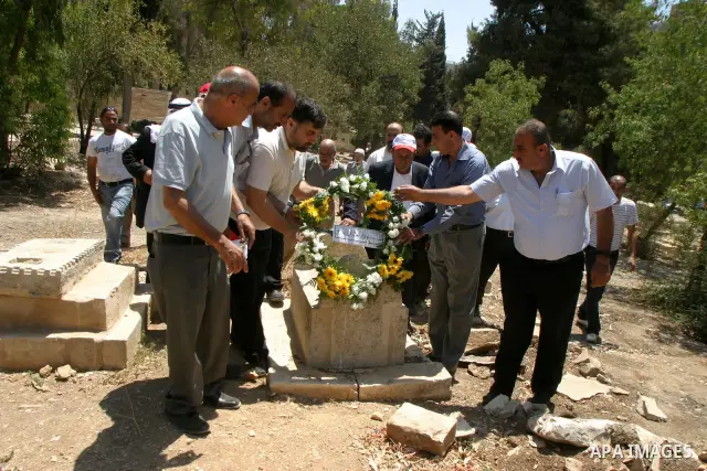Palestinians take a part in a protest to the Israeli violations of the Islamic sanctities in Jerusalem on July 21, 2011. where washed away and destroyed lately about 100 grave in "Maaman allah" the historic Islamic grave...