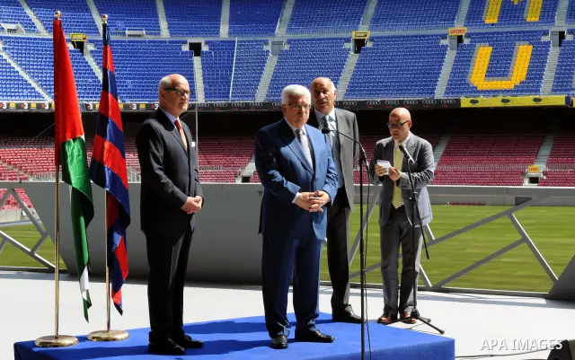 Palestinian president Mahmud Abbas meets with FC Barcelona's vice president Carles Vilarrubi during a visit at the Camp Nou Stadium in Barcelona on July 21, 2011. Abbas is on a two-day visit in Spain aimed at drumming up...