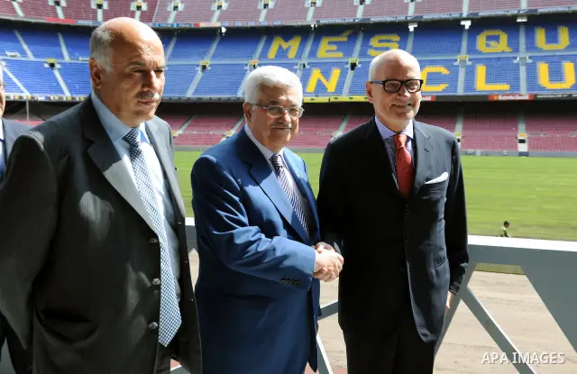 Palestinian president Mahmud Abbas meets with FC Barcelona's vice president Carles Vilarrubi during a visit at the Camp Nou Stadium in Barcelona on July 21, 2011. Abbas is on a two-day visit in Spain aimed at drumming up...