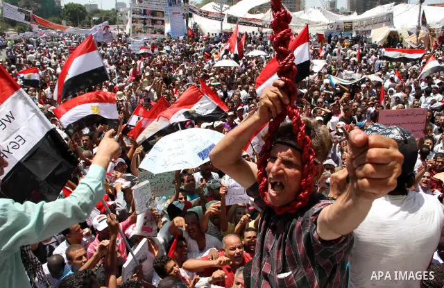 A protester holds a noose as he shouts revenge slogans after Friday prayers at Tahrir square in Cairo July 22, 2011. Egypt's prime minister promised on Thursday to set up an anti-corruption body and work to end a 30-year...