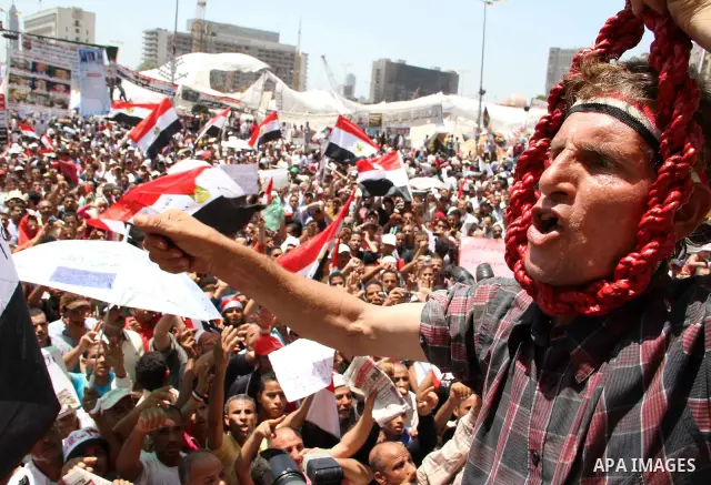 A protester holds a noose as he shouts revenge slogans after Friday prayers at Tahrir square in Cairo July 22, 2011. Egypt's prime minister promised on Thursday to set up an anti-corruption body and work to end a 30-year...