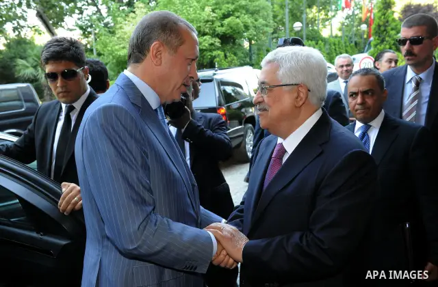 Palestinian President Mahmoud Abbas (Abu Mazen) shakes hands with Turkish Prime Minister Recep, Tayyip Erdogan during a meeting in Istanbul on July 23, 2011. Photo by Thaer Ganaim