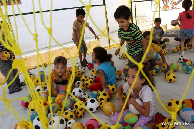 Palestinian children enjoy playing balls at Kindergarten in Gaza City on July 23, 2011. Photo by Mohammed Asad