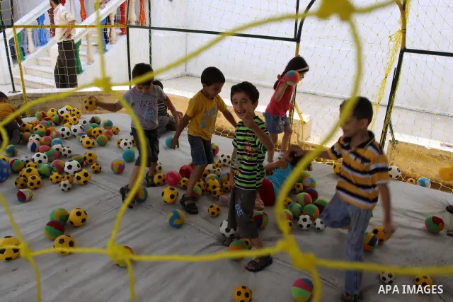 Palestinian children enjoy playing balls at Kindergarten in Gaza City on July 23, 2011. Photo by Mohammed Asad
