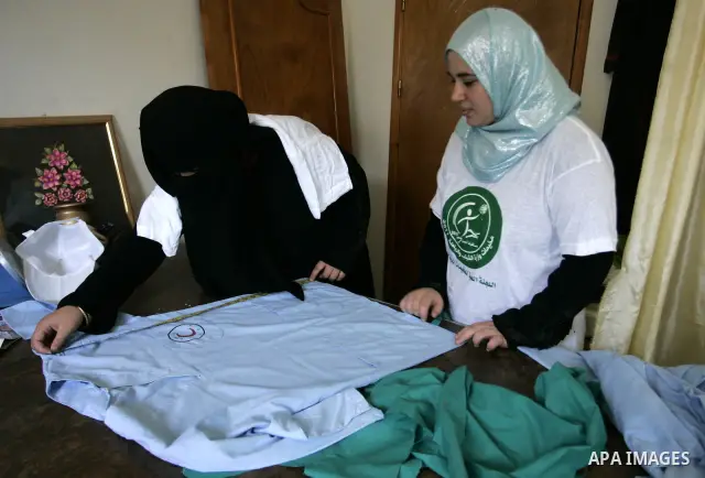 Palestinian women participate in a summer camp organised by the Ministry of Youth and Sports in the southern Gaza Strip town of Rafah on July 23,2011. Photo by Abed Rahim Khatib