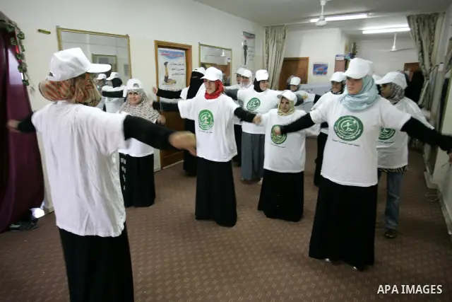 Palestinian women participate in a summer camp organised by the Ministry of Youth and Sports in the southern Gaza Strip town of Rafah on July 23,2011. Photo by Abed Rahim Khatib