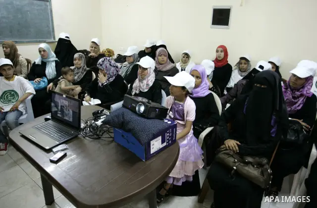 Palestinian women participate in a summer camp organised by the Ministry of Youth and Sports in the southern Gaza Strip town of Rafah on July 23,2011. Photo by Abed Rahim Khatib