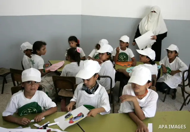 Palestinian children participate in a summer camp organised by the Ministry of Youth and Sports in the southern Gaza Strip town of Rafah on July 23,2011. Photo by Abed Rahim Khatib