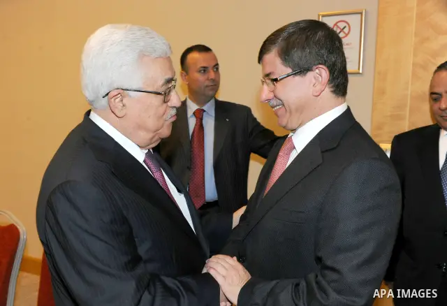 Palestinian President Mahmud Abbas meets with Turkish Foreign Minister, Ahmed Dawoud Ouglo in Istanbul on July 23, 2011. Mahmud Abbas said Saturday that the Palestinians' bid for UN membership was forced upon them by Isr...