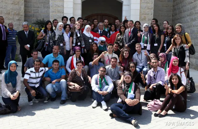 Palestinian Prime Minister, Salam Fayyad meets with the Arab youth delegation who participate in the second Arab-Palestinian exchange in the West Bank city of Ramallah on July 24, 2011. Photo by Mustafa Abu Dayeh