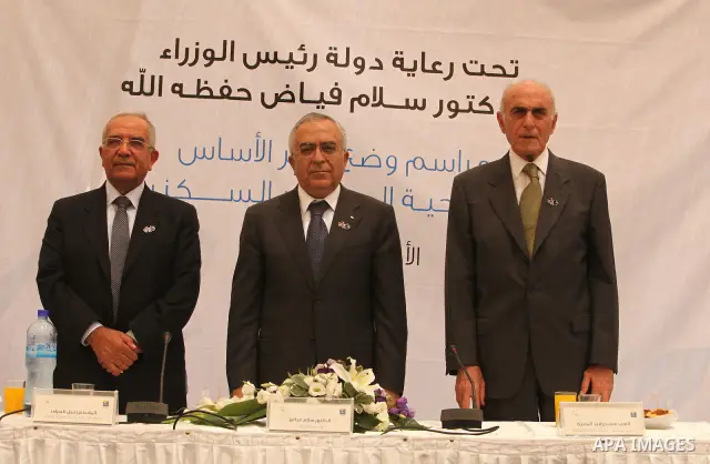 Palestinian Prime Minister, Salam Fayyad lays the cornerstone for al-Ghadeer housing area in the West Bank city of Ramallah on July 24, 2011. Photo by Mustafa Abu Dayeh