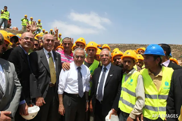 Palestinian Prime Minister, Salam Fayyad lays the cornerstone for al-Ghadeer housing area in the West Bank city of Ramallah on July 24, 2011. Photo by Mustafa Abu Dayeh