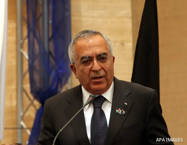 Palestinian Prime Minister, Salam Fayyad lays the cornerstone for al-Ghadeer housing area in the West Bank city of Ramallah on July 24, 2011. Photo by Mustafa Abu Dayeh